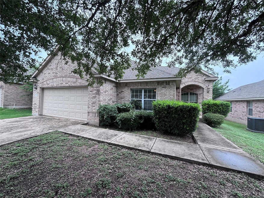 View of front of property featuring brick siding,