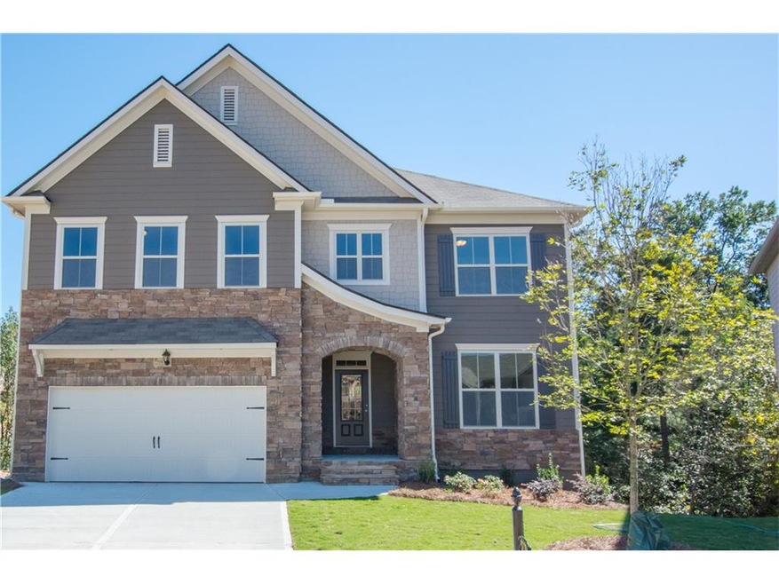 Gorgeous Home with Stone Accents and Covered Entry