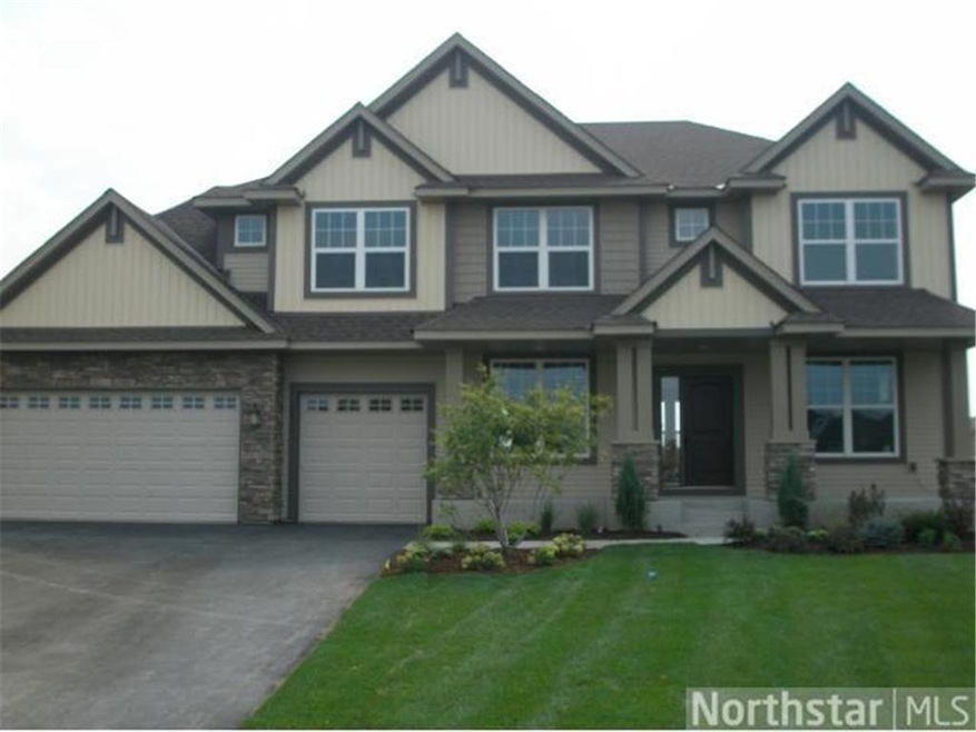 Yard is fully landscaped with sprinkler system and