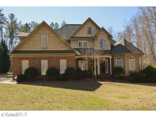 Exterior Front. This lovely transitional home sits on 2.86 acres of quiet serenity and backs up to beautiful Summit Lake. A builders previous home, this well designed and executed home has an open floor plan, beautiful hardwood flooring, and heated ceramic floors.