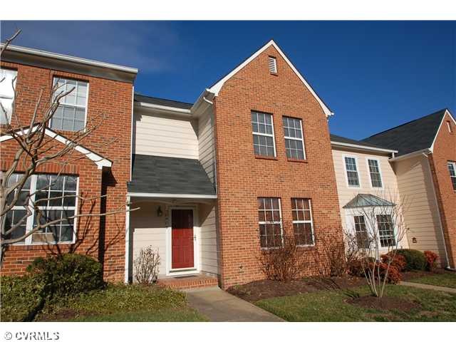Exterior Front - Brick and hardboard front with co