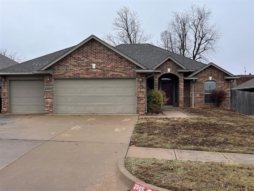 Single story home featuring a garage