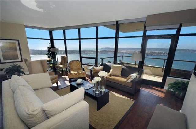The interior boasts rich hardwood floors in the livingareas and motorized shades throughout!