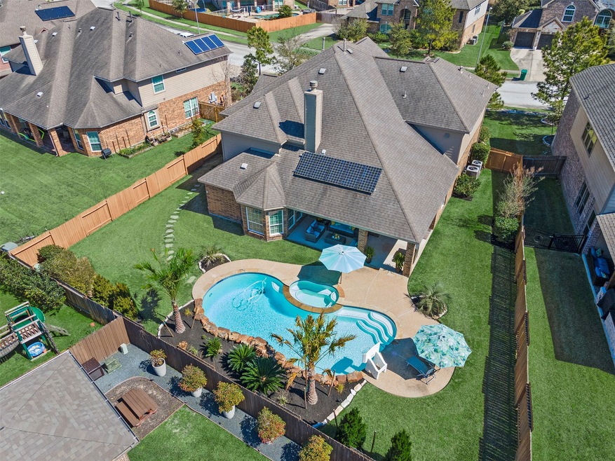 Look at this oversized lot with plenty of yard spa
