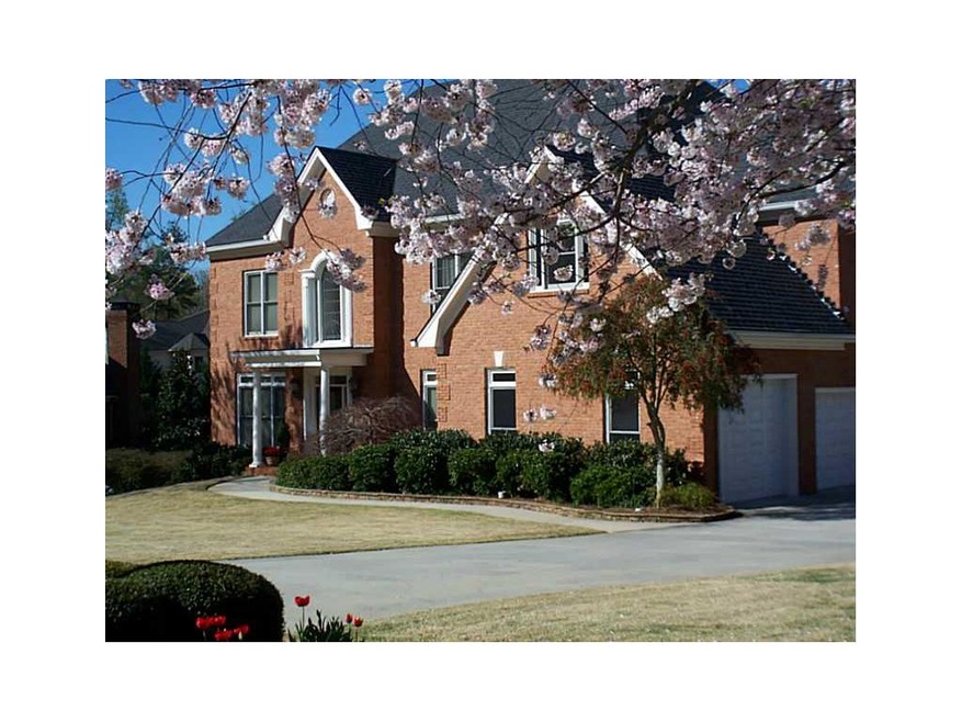 Exterior Front. Spring is in bloom!  The back yard