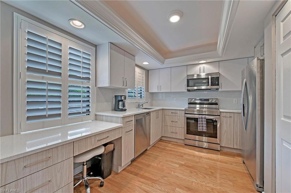 Renovated kitchen with desk/workstation.