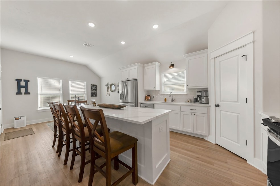 Kitchen featuring stainless steel appliances, a ki
