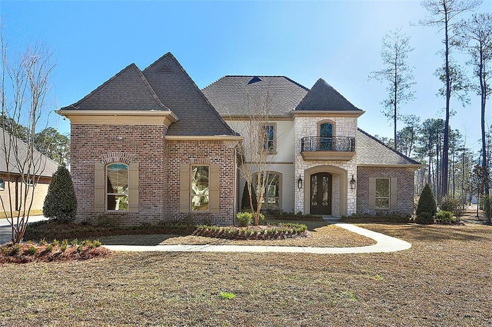 Situated on the rear pond, this home has an elegan