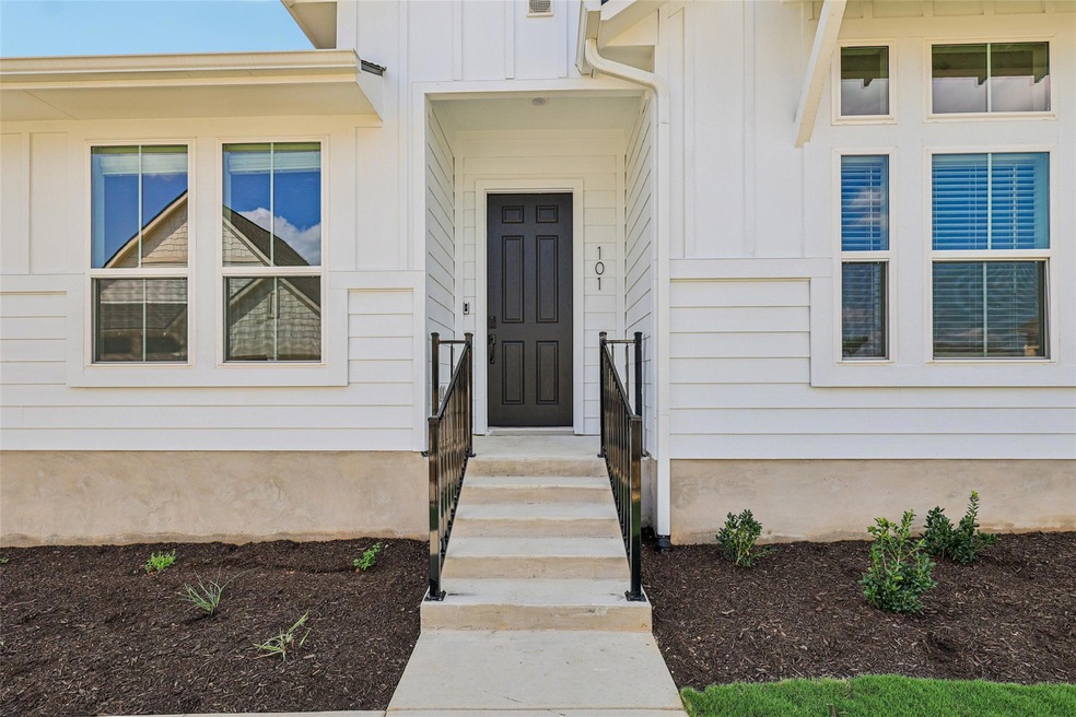 Entrance to property featuring board and batten s