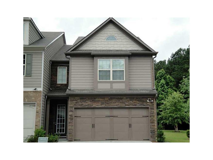 Exterior Front. Garage-side end-unit home. This is