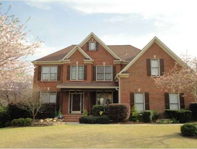 Exterior Front. 3-sided Brick Beauty on large leve