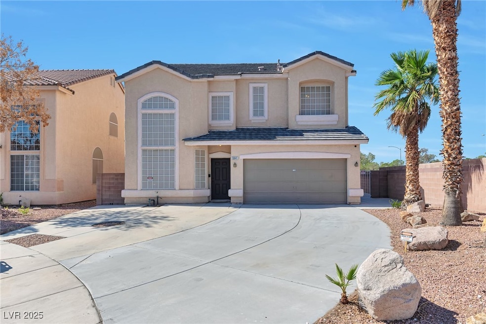 Traditional-style house featuring stucco siding, d