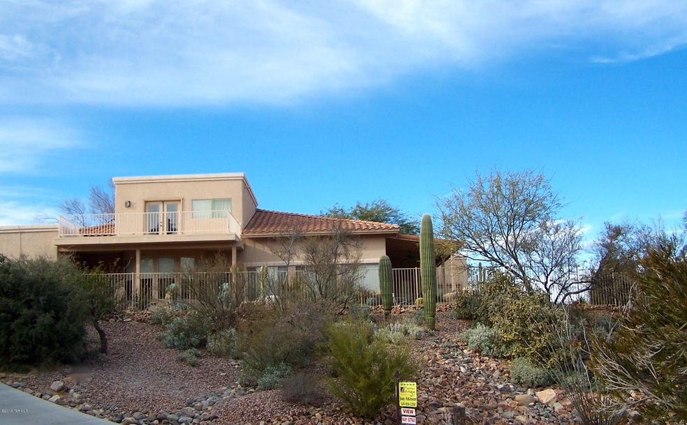 Side View of Home on Hill Top.