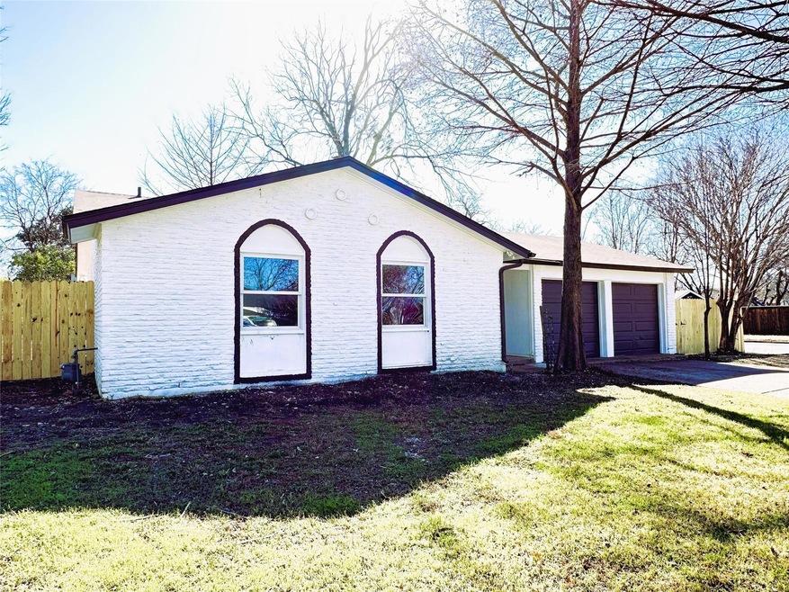 Front of structure featuring a lawn