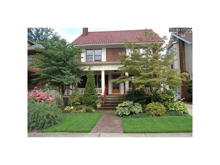 Wow! Beautiful brick home with french colums and cozy front porch.  Inviting European designed landscaping makes this home one of a kind.