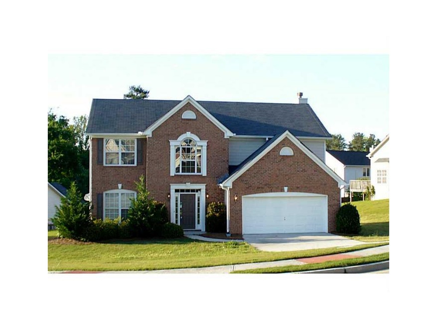 Exterior Front. Stately Brick Front Home with Arch
