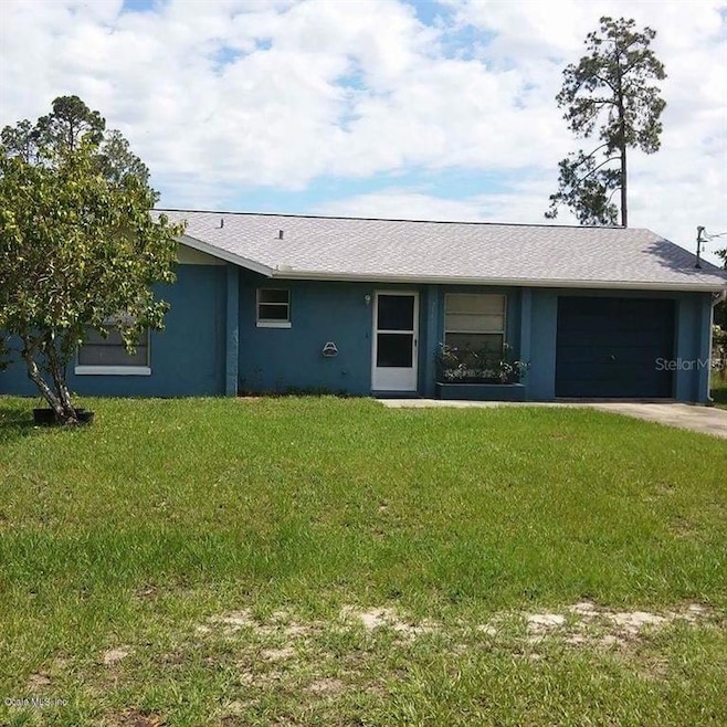 21411 SW Honeysuckle St, Dunnellon, FL 34431 - photo 1