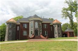 You are home! Castle like features, all brick home on a hill. Gorgeous views. Circle drive.