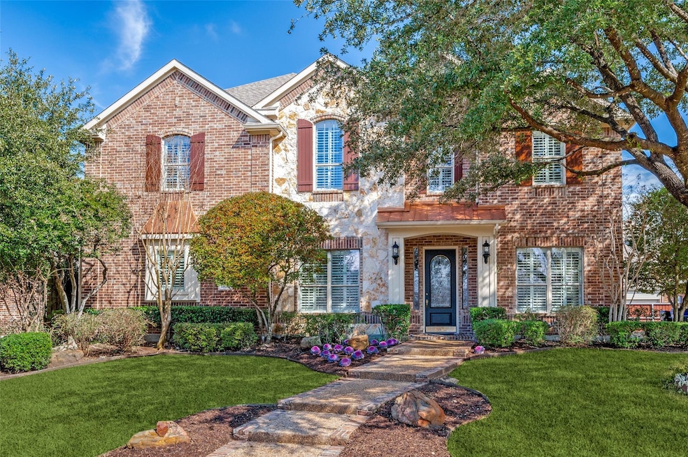 Stunning brick & stone home with copper accents