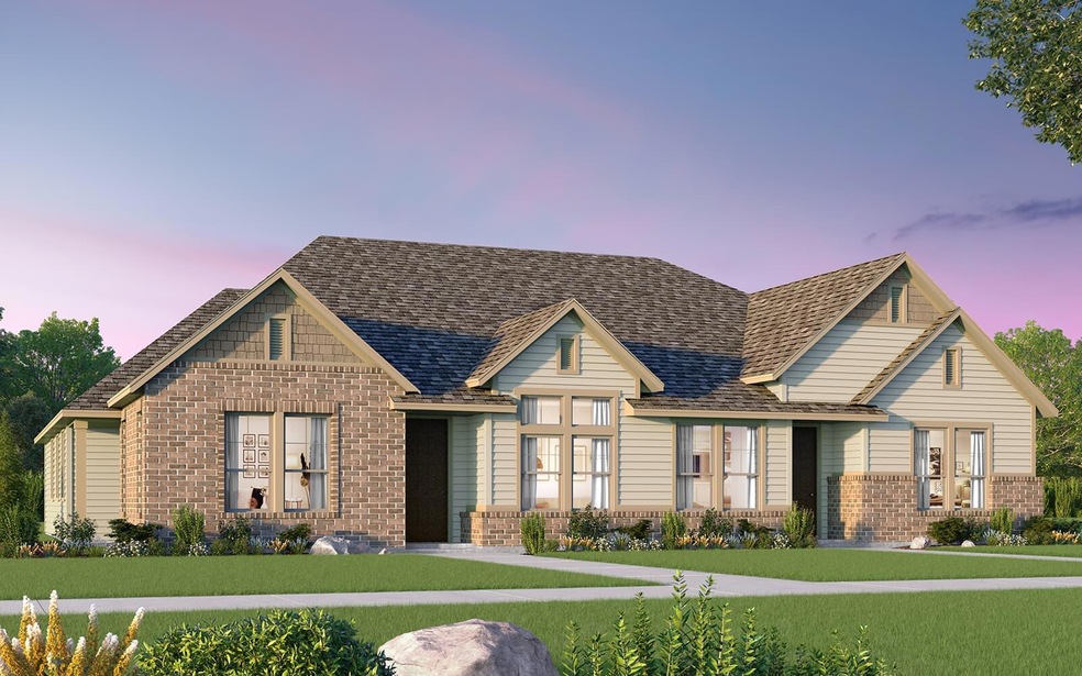 View of front of property featuring brick siding 