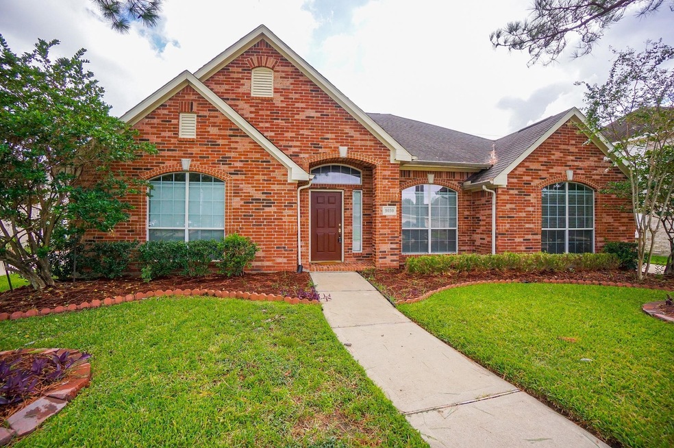 9030 Sunny Ridge Dr, Houston, TX 77095 - photo 1