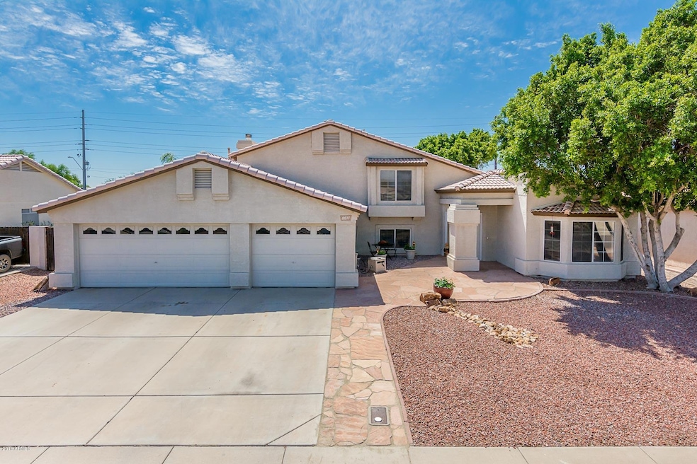 8811 W Wethersfield Rd - MLS-2