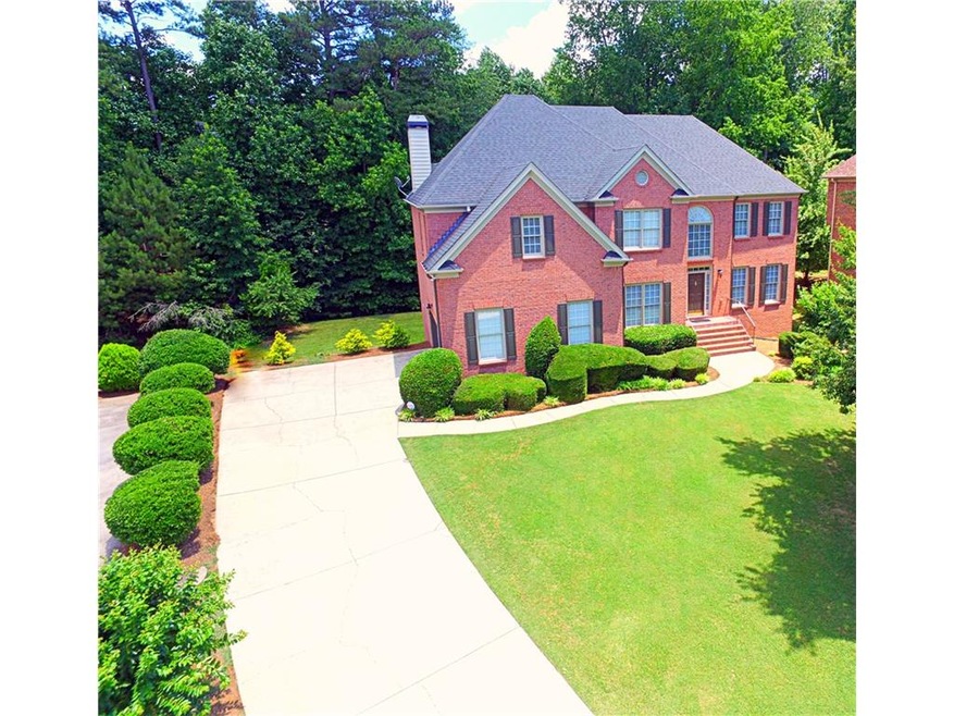 Stunning executive 3 sided brick home.