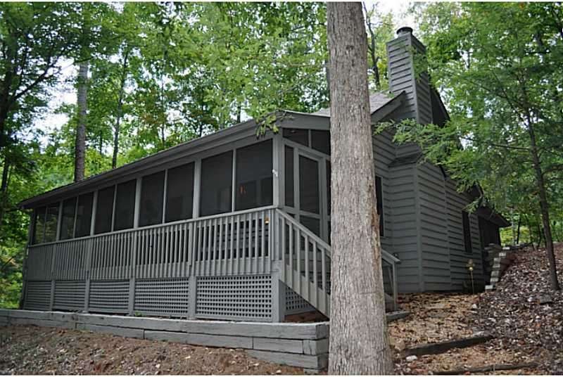 Exterior Front. Charming rustic cabin in the woods