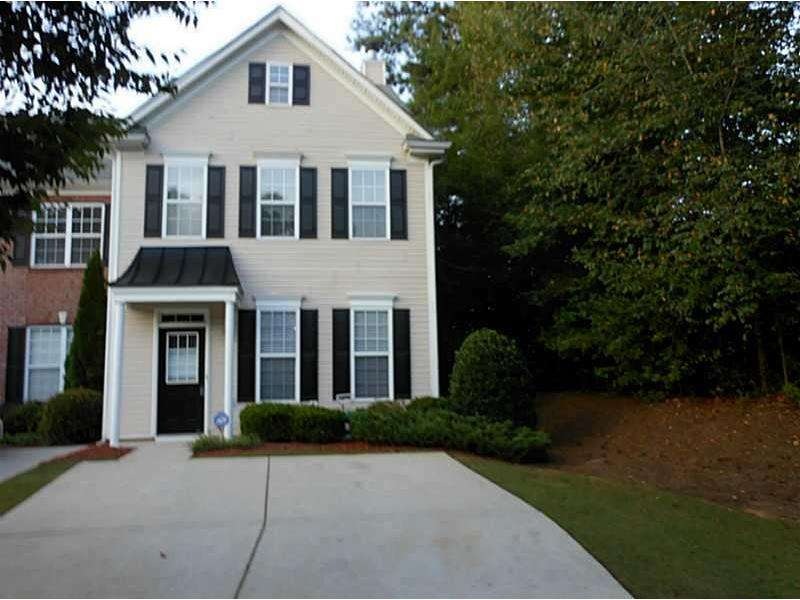 Exterior Front. End Unit with curb appeal.