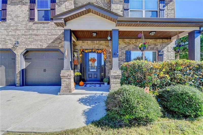 Beautiful Home with Front Brick and Rocking Chair 