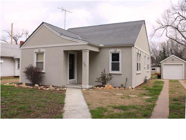 Cute stucco house, inside and out.