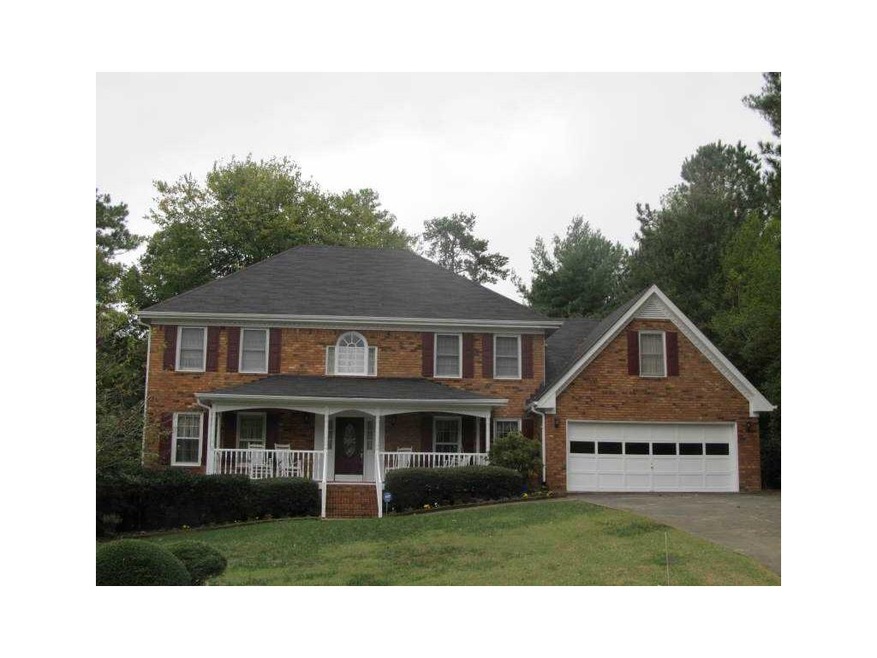 Exterior Front. 3 sided brick traditional with ful