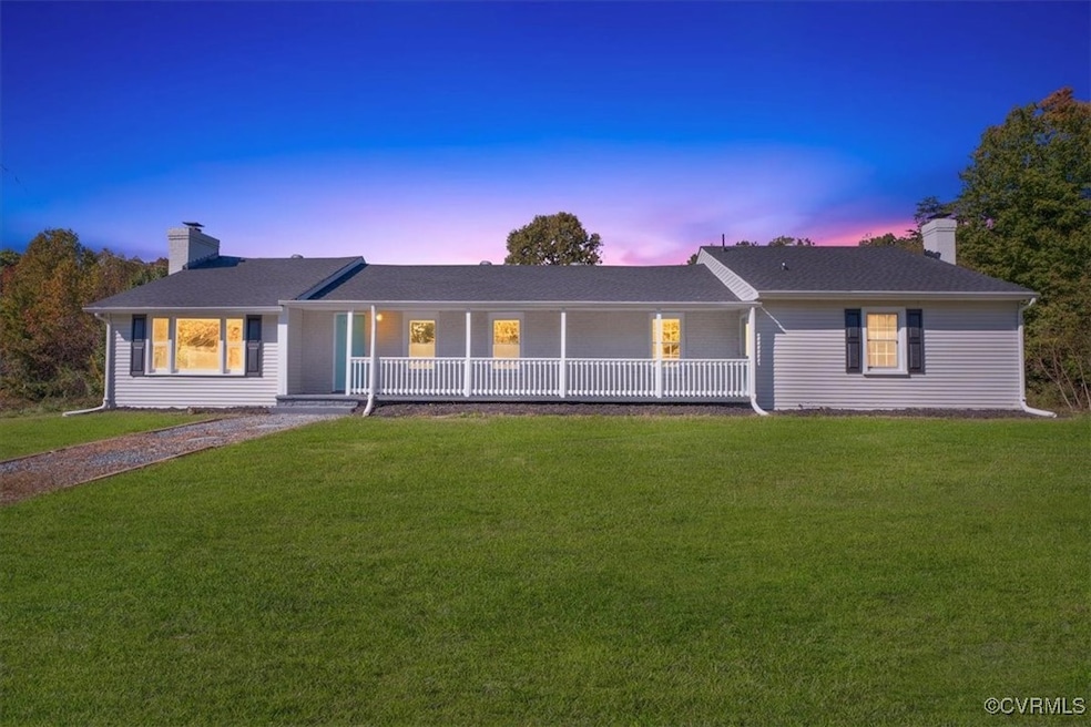 View of front of home with a lawn
