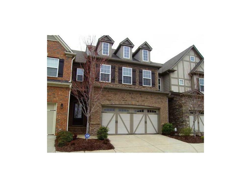 Exterior Front. Gorgeous brick and stone townhome 