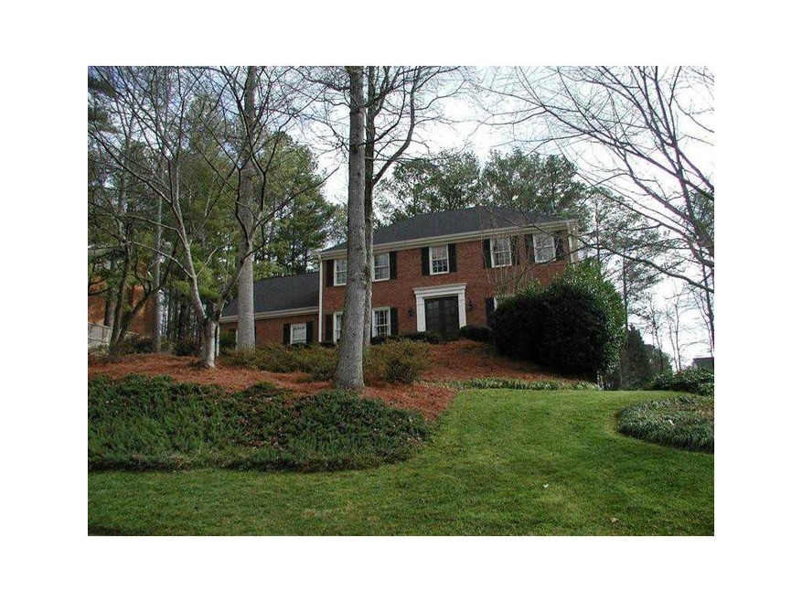 Exterior Front. Gorgeous 3-sides brick traditional