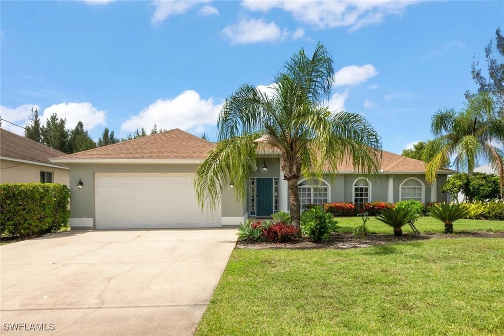 View of front of property featuring stucco siding,