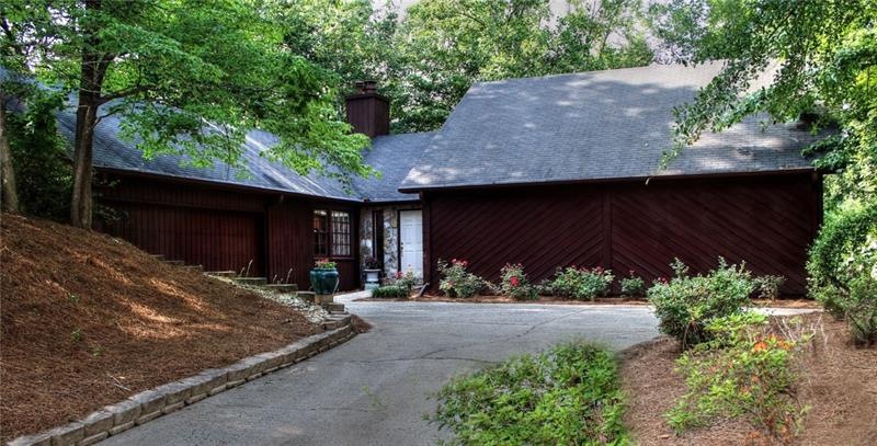 Home is on cul-de-sac nestled behind landscaped pr