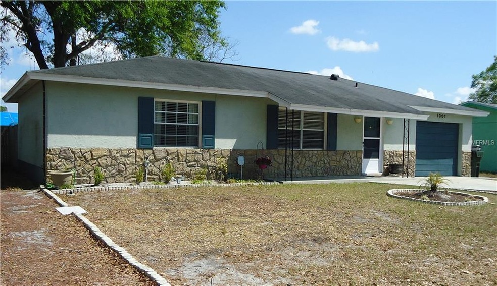 Front elevation with rock accent and fresh colors.