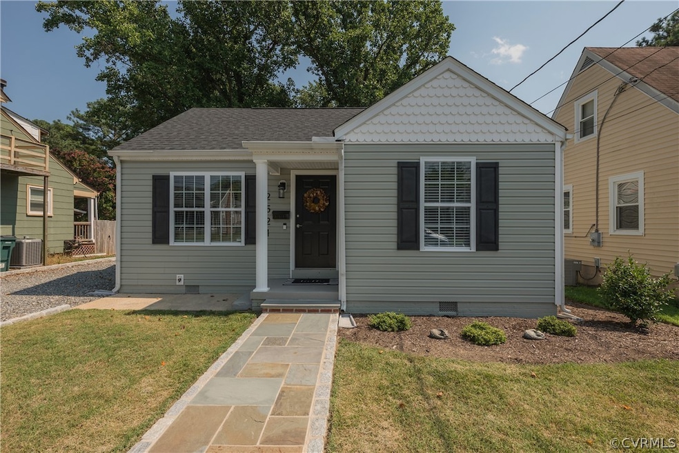 Bungalow-style home with central air condition uni