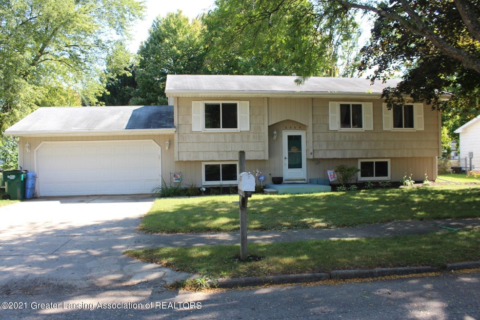 6009 Chesapeake Dr, Lansing, MI 48911 - photo 1