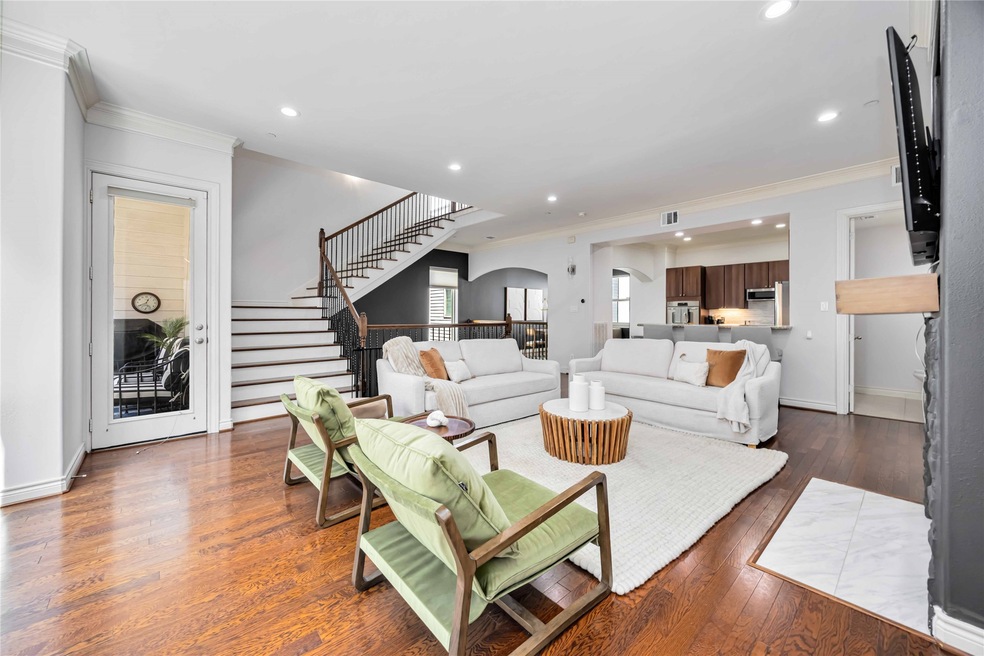 Main living area that opens to the kitchen and din
