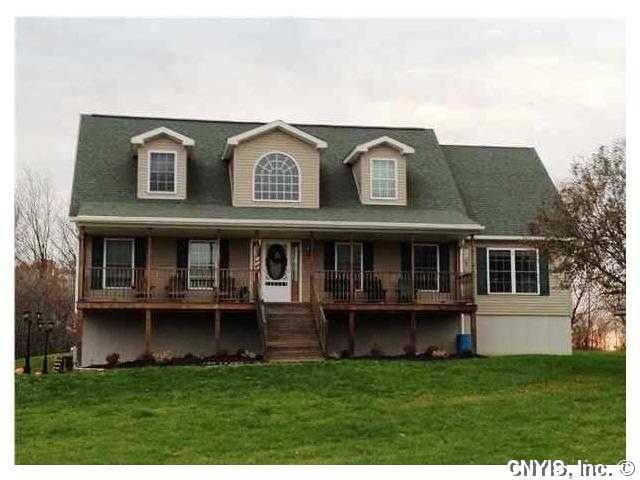 Exterior Front. Charming and spacious Cape Cod sur