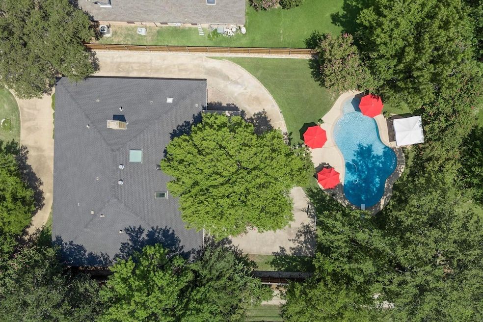 Aerial view of beautiful property with an oasis Pool!