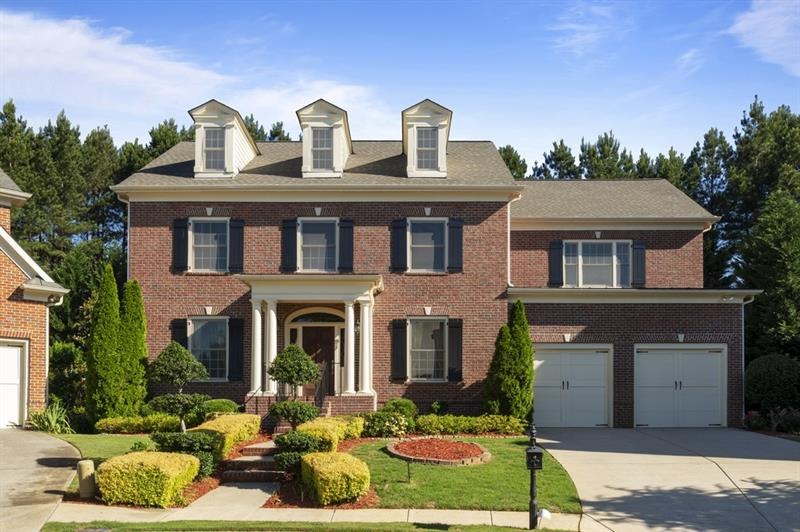 Beautifully maintained and landscaped brick home o