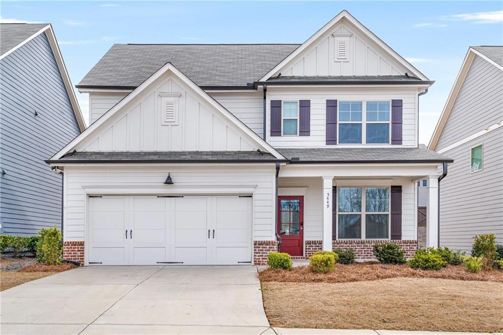 Craftsman house with a garage and covered porch