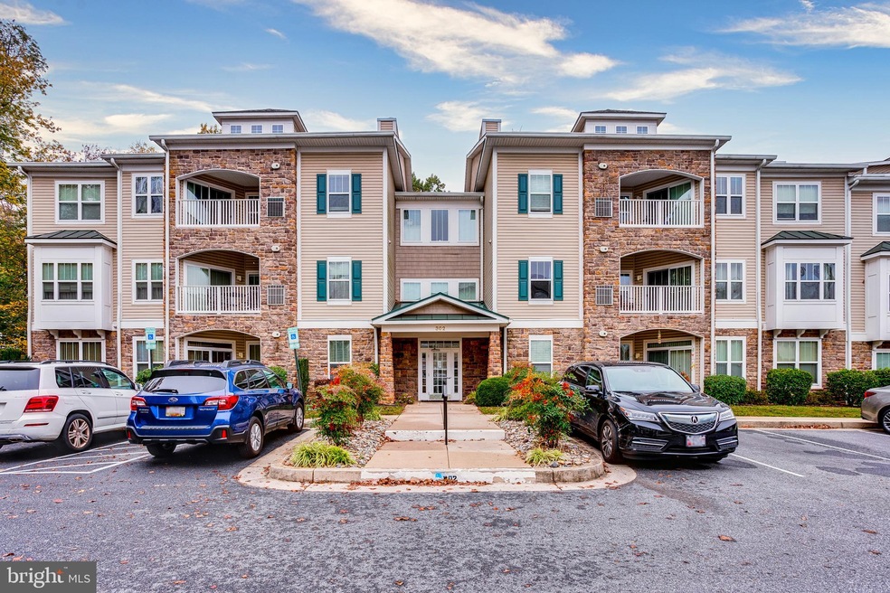302 Wyndham Cir unit C, Owings Mills, MD 21117 - photo 1