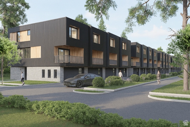 View of property featuring an attached garage