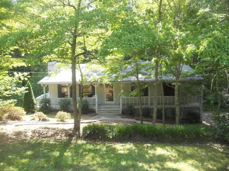 Exterior Front. FABULOUS WRAP AROUND ROCKING CHAIR