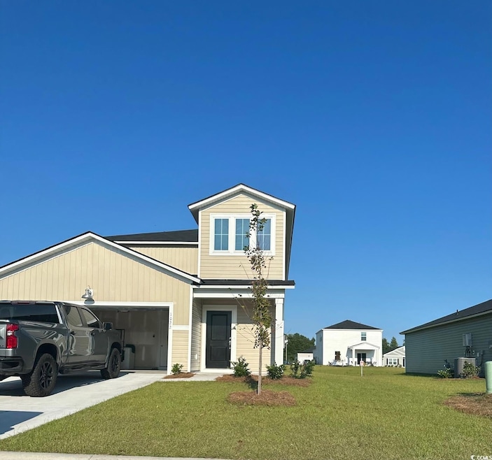 View of front of property featuring central AC, a 