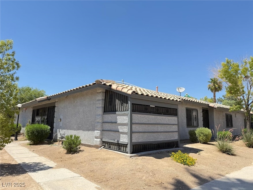 View of home's exterior with stucco siding